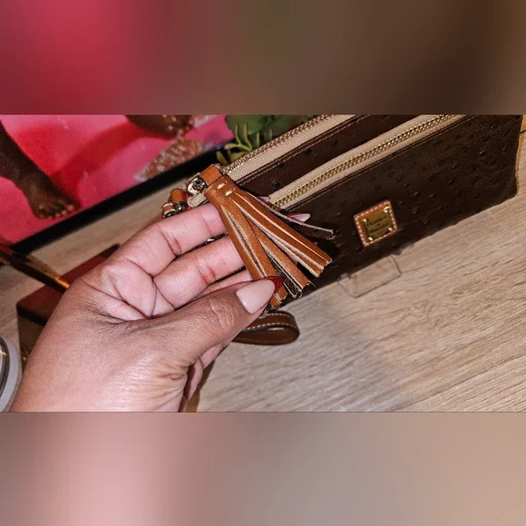 Dooney & Bourke Ostrich Dark Brown Wristlet with Gold Accents - Picture 3 of 8